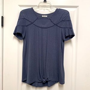 Top with cut out detail and knot